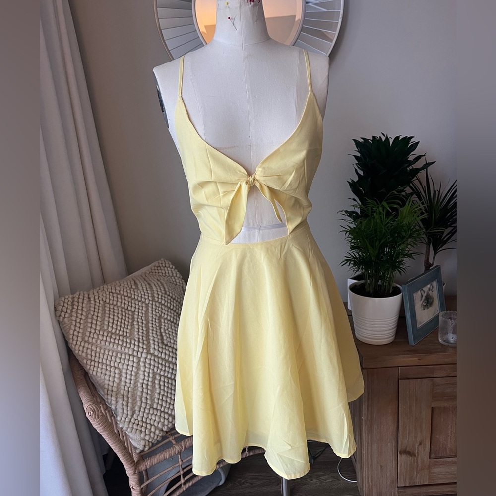 Pale yellow tie up dress urban outfitters. Size 10